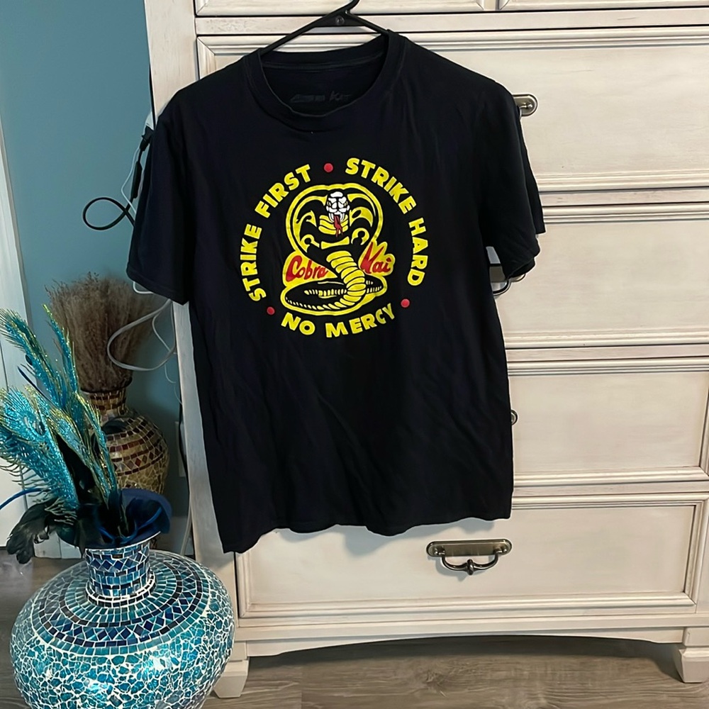 Men’s cobra Kai size medium first strike hard no mercy, canvas, T-shirt